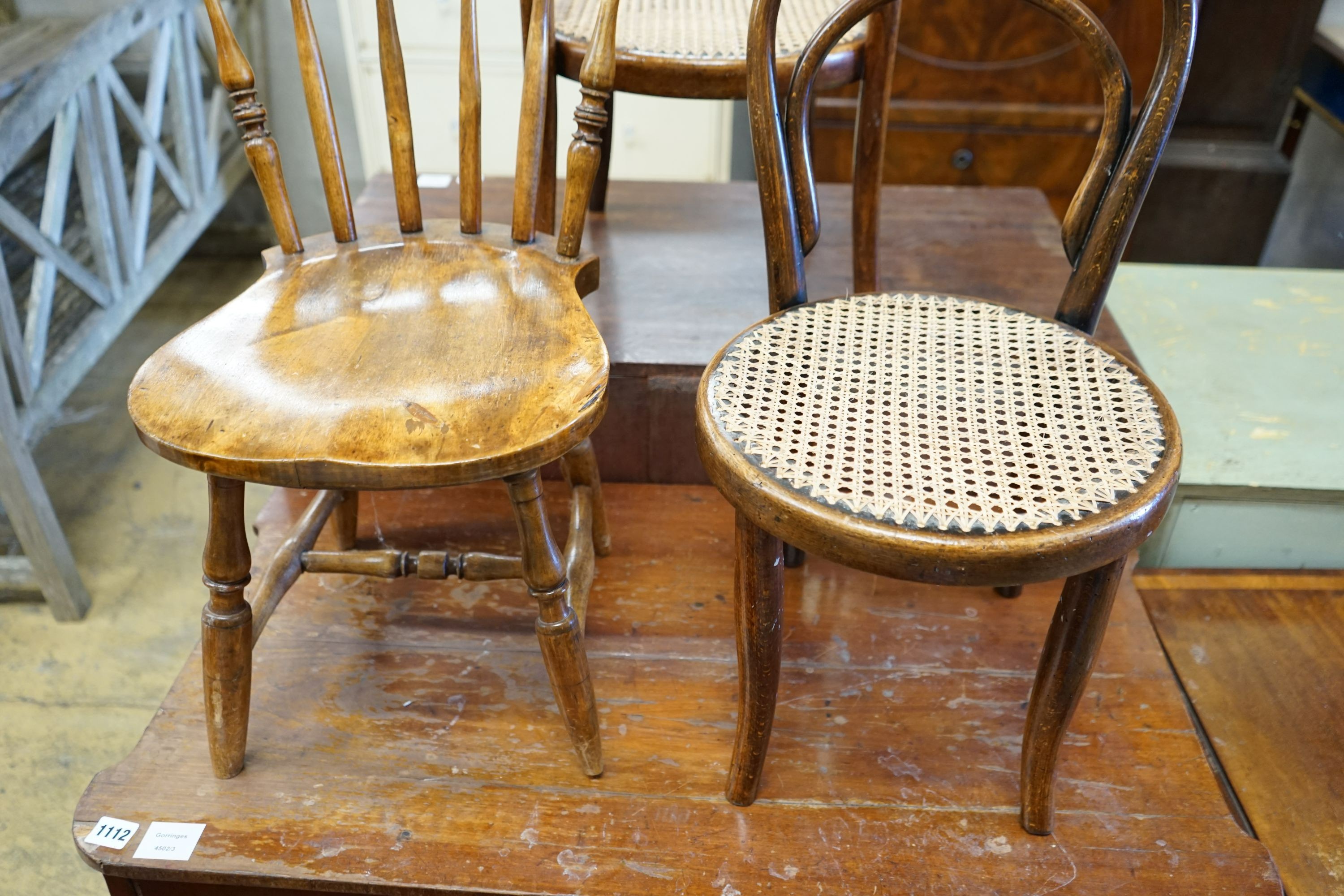 Two early 20th century childs' beach cane seat bentwood chairs and a child's Windsor chair